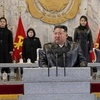 北, 이례적으로 무기없는 열병식…김정은, 주애와 참관